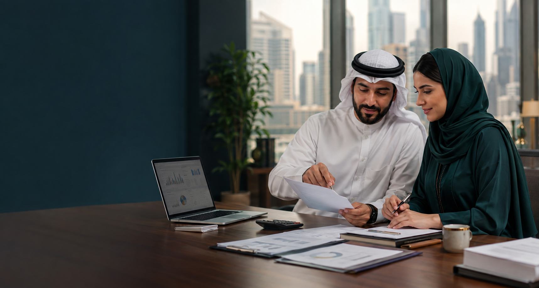 Accounting professionals collaborating on business records